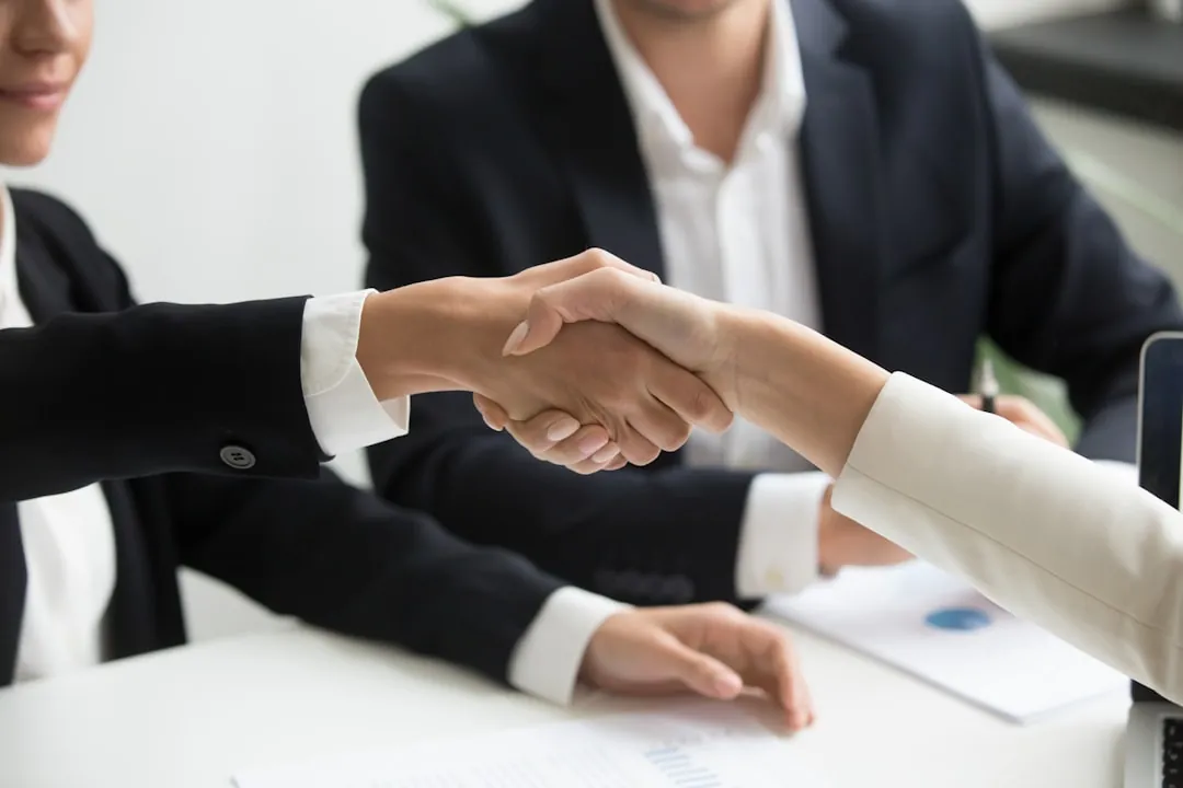 business handshake office
